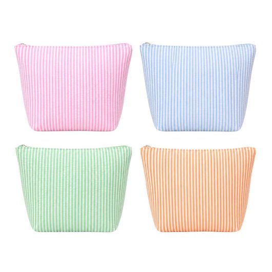 Cute seersucker travel makeup bag in pink blue green and orange for cute girls trip, mothers day, birthday, valentines day gift. Adorable cute and stylish makeup travel pack.