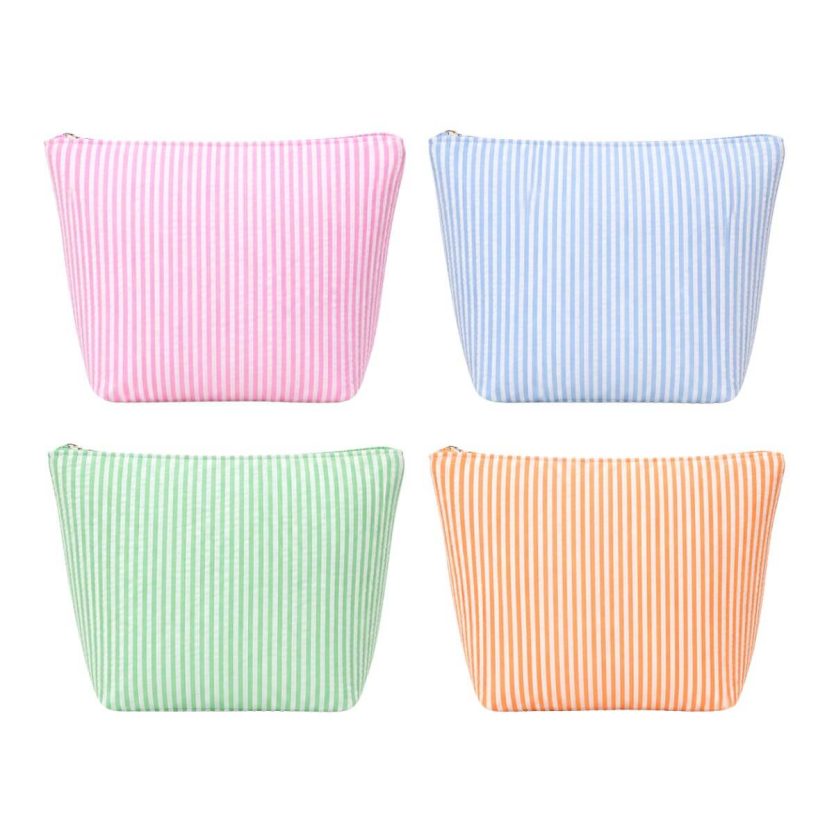 Cute seersucker travel makeup bag in pink blue green and orange for cute girls trip, mothers day, birthday, valentines day gift. Adorable cute and stylish makeup travel pack.