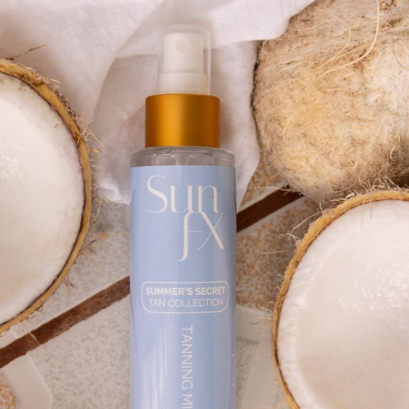 Self tanning water mist coconut scented cute blue bottle with the perfect sunfx tan no bronzer no transder